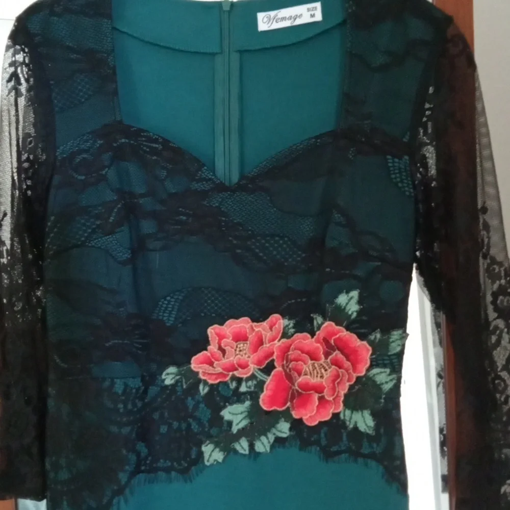 Elegant Teal Dress with Black Lace Sleeves and Floral Accents - Picture 3 of 3